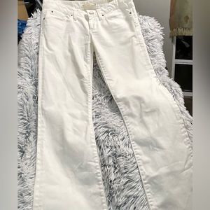 Gap cream colored low rise boot cut jeans
